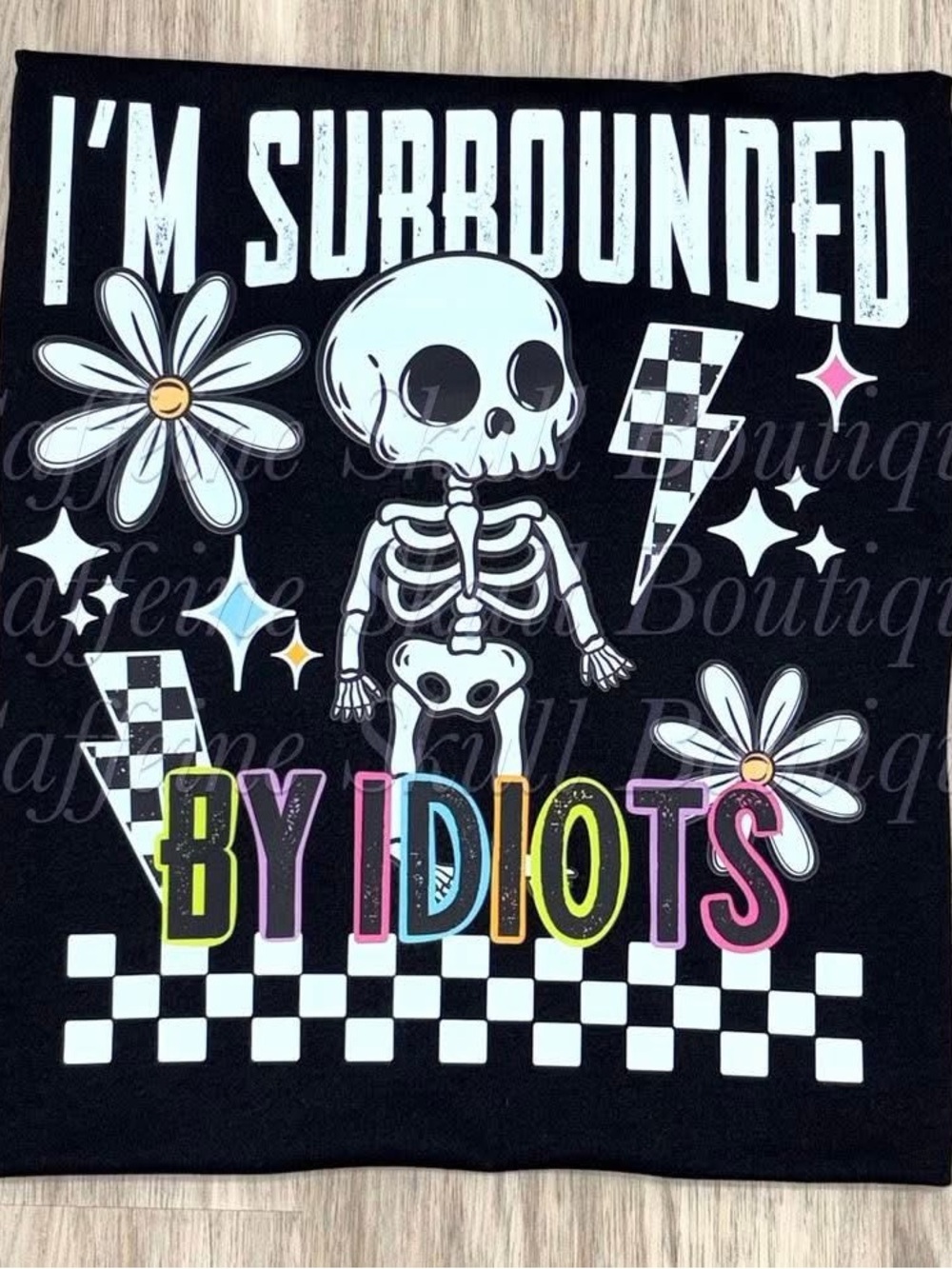 Bella Canvas Black Short Sleeve Tee with Multicolor Skull & Flower Graphic